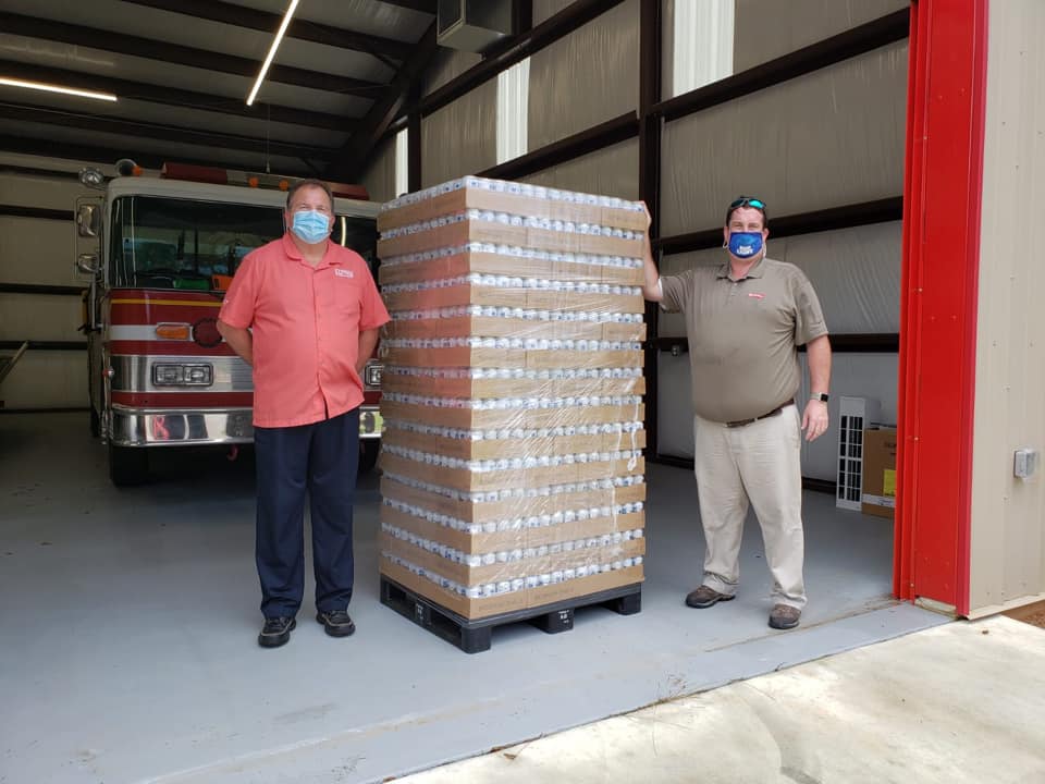 The Lewis Bear Company helps deliver water for local relief efforts.